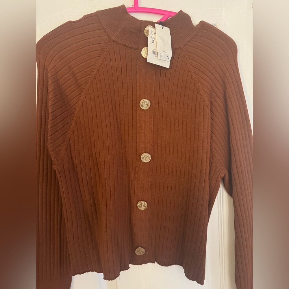 Brown buttoned sweater
